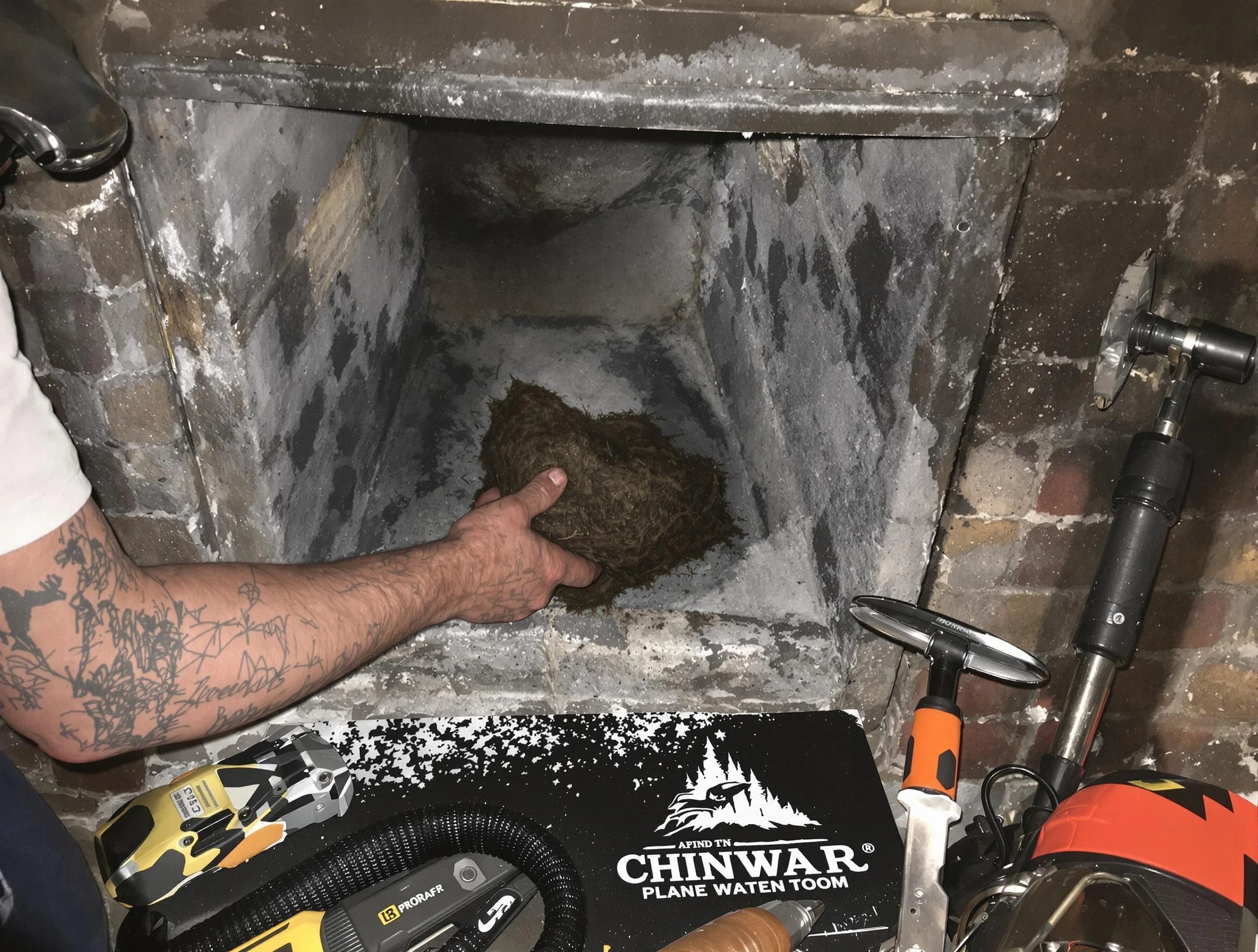 West Windsor Chimney Sweep safely removing debris and screening chimney in West Windsor, NJ