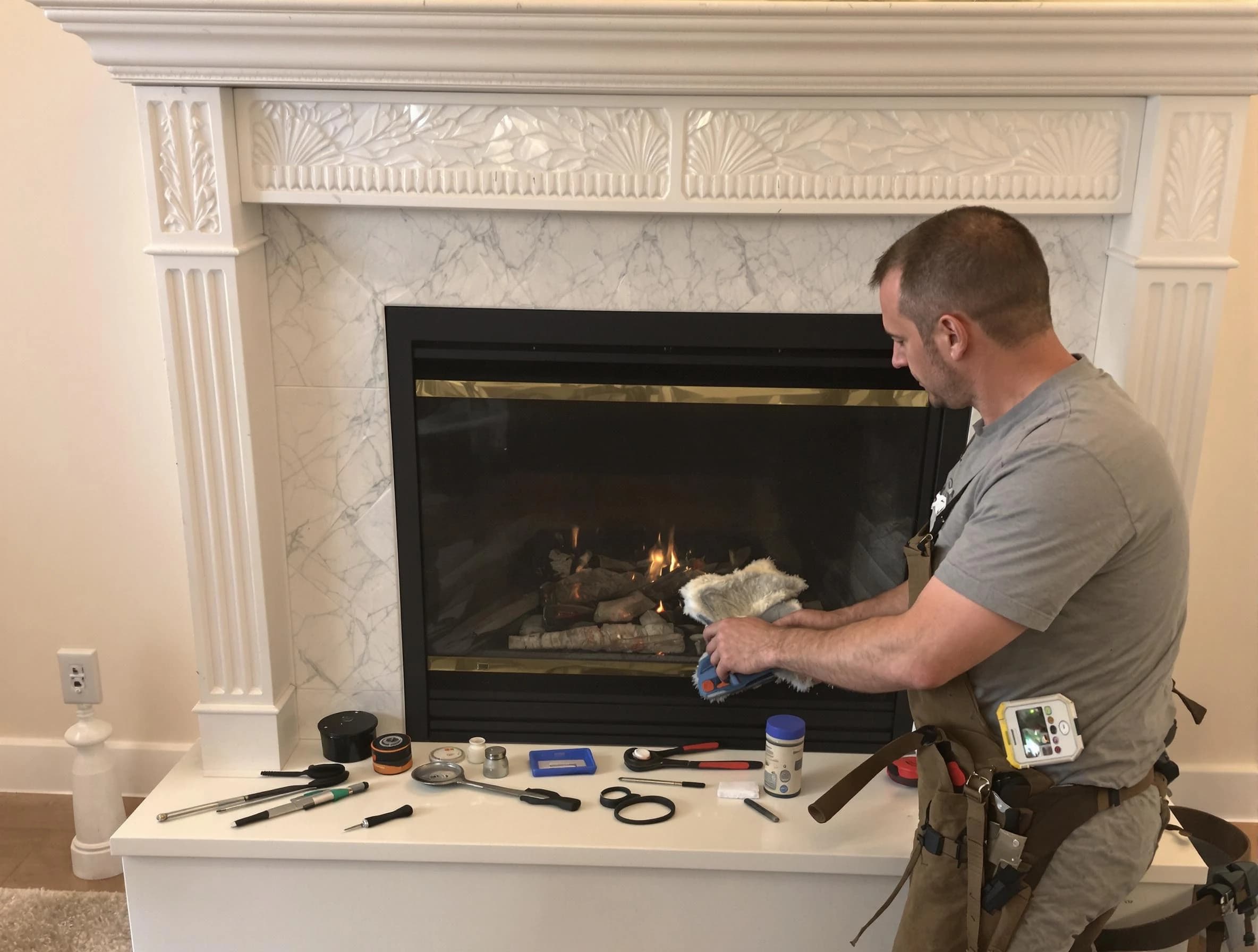 West Windsor Chimney Sweep performing fireplace maintenance in West Windsor, NJ
